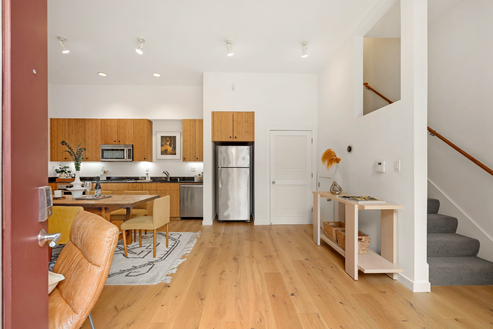 Entry into the open-concept living and kitchen area