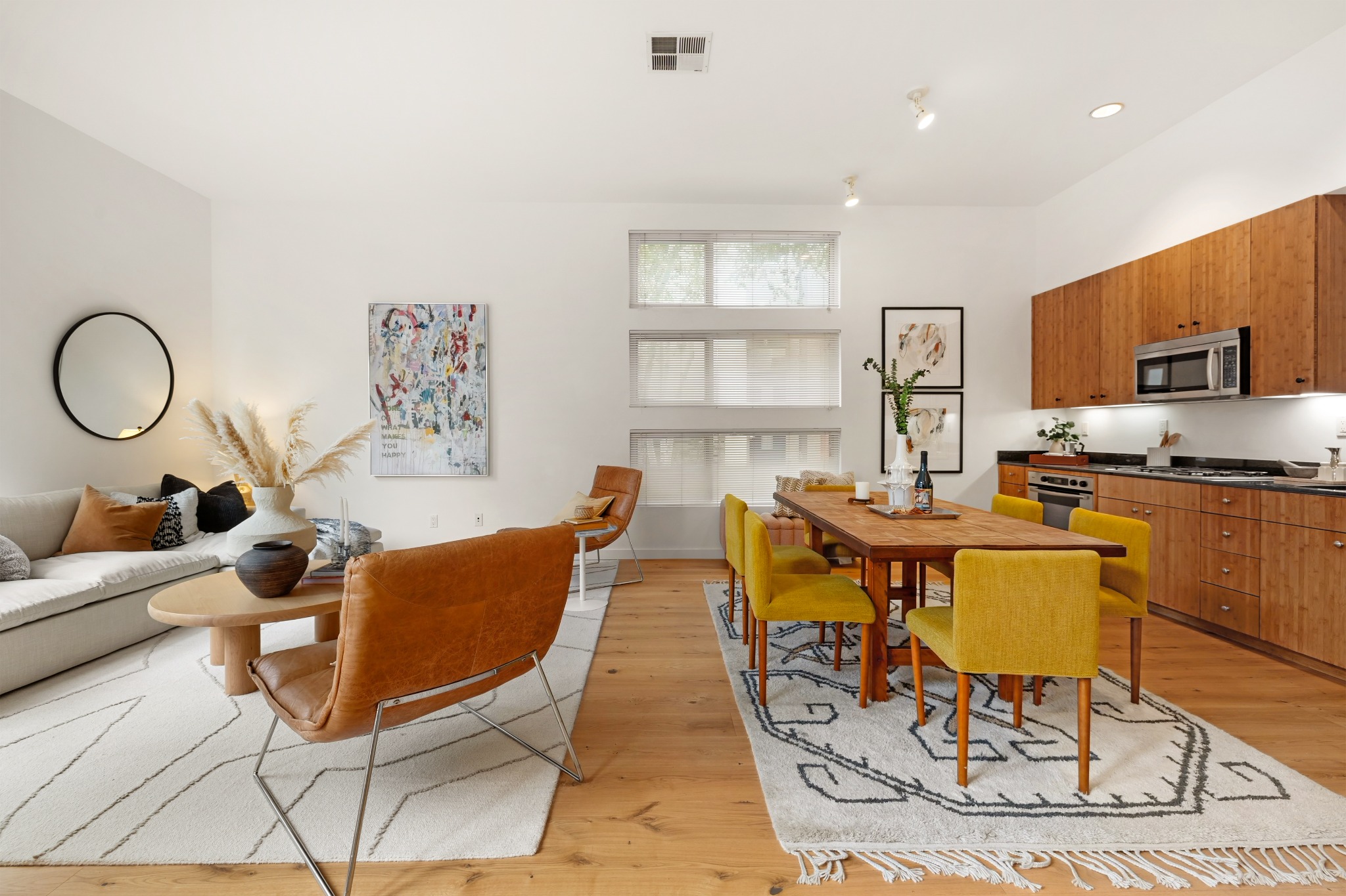 Living dining and kitchen with soaring ceilings