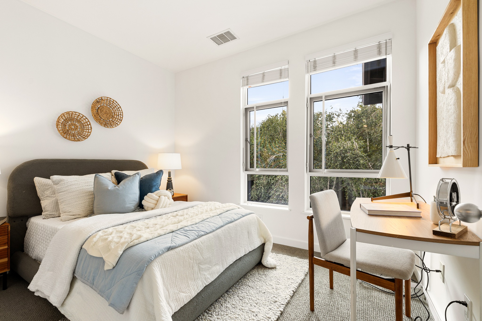 Second bedroom staged as bedroom and home office