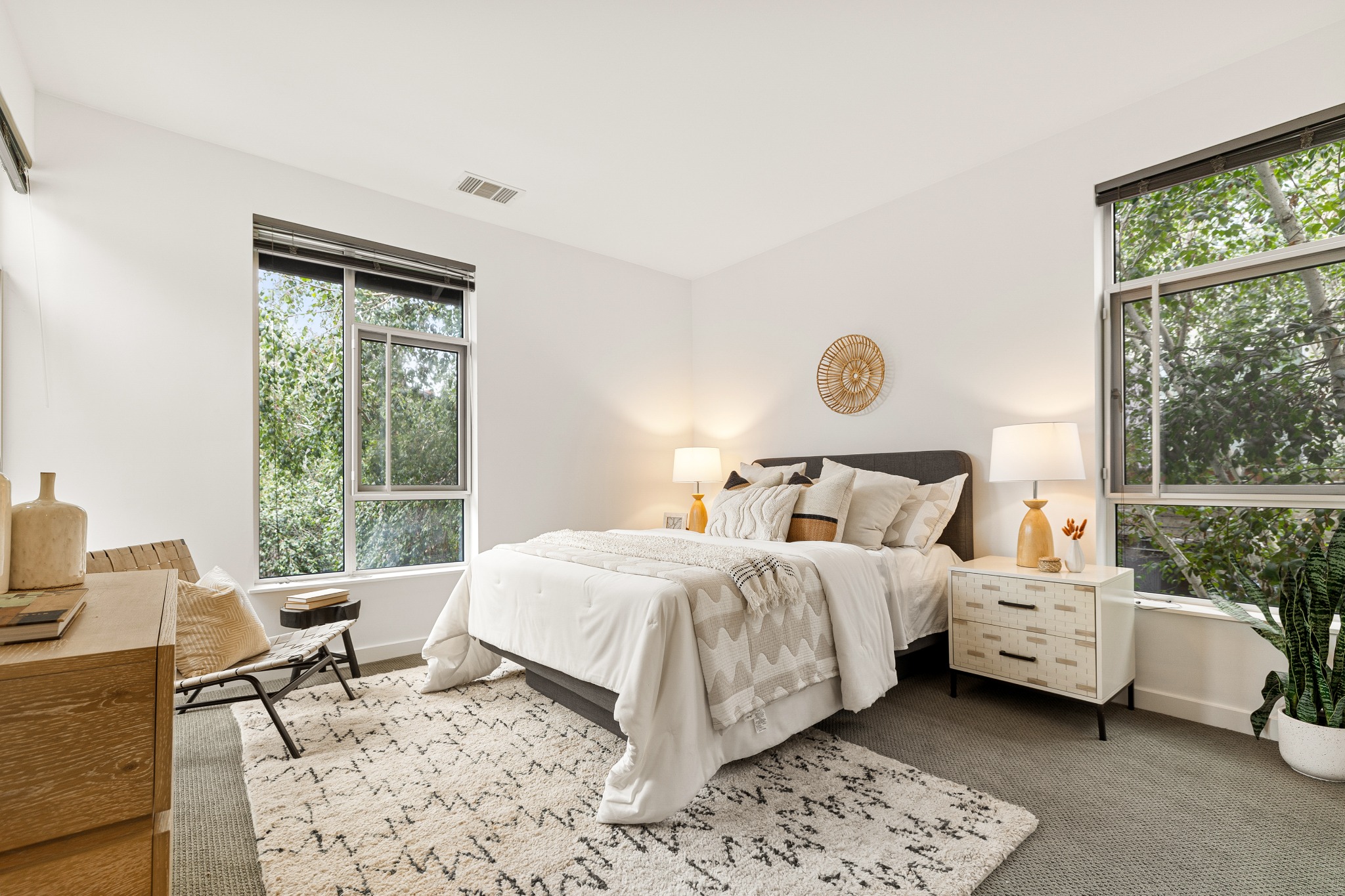 Primary bedroom with corner windows