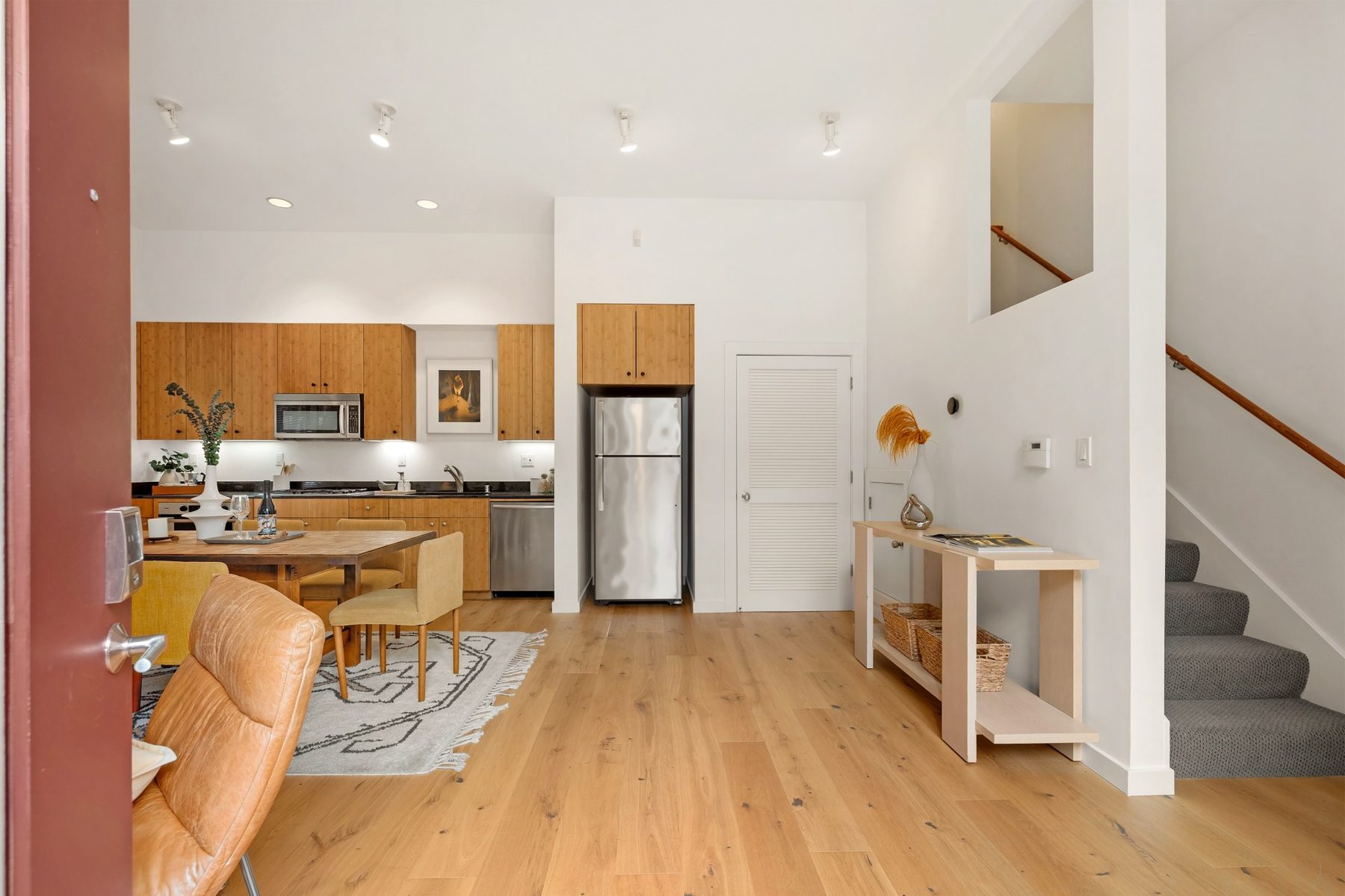 Entry into the open-concept living and kitchen area